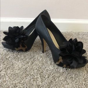 Black/cheetah pumps